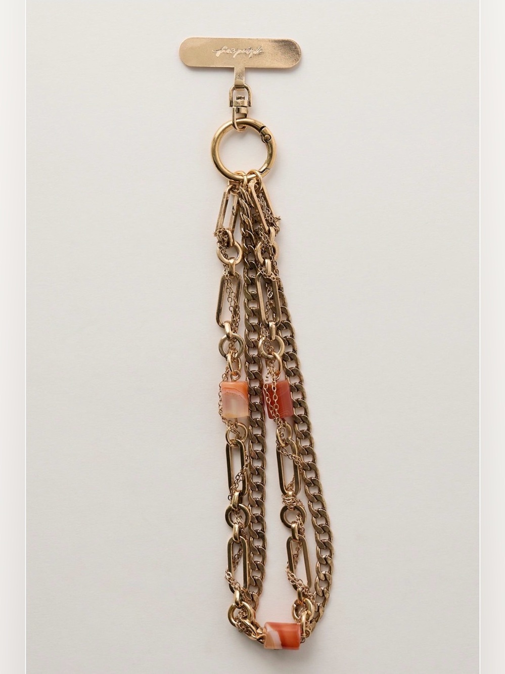 Free People Layered Chain Phone Wristlet NWT. Antique Gold with Precious Stone